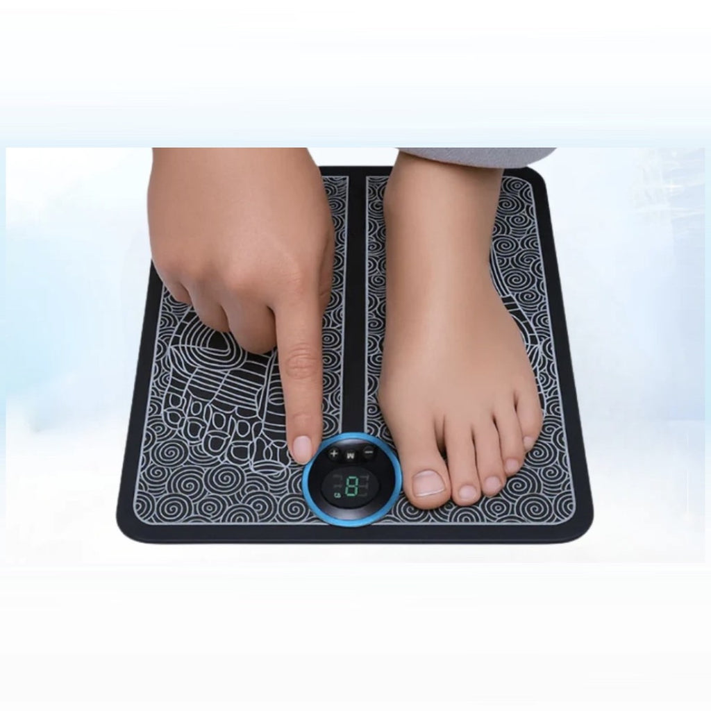 DeepSwitch Leg Revival Mat in use, foot on the mat and finger on the control